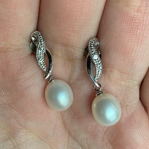 Pandora pearl infinity earrings (sterling silver)